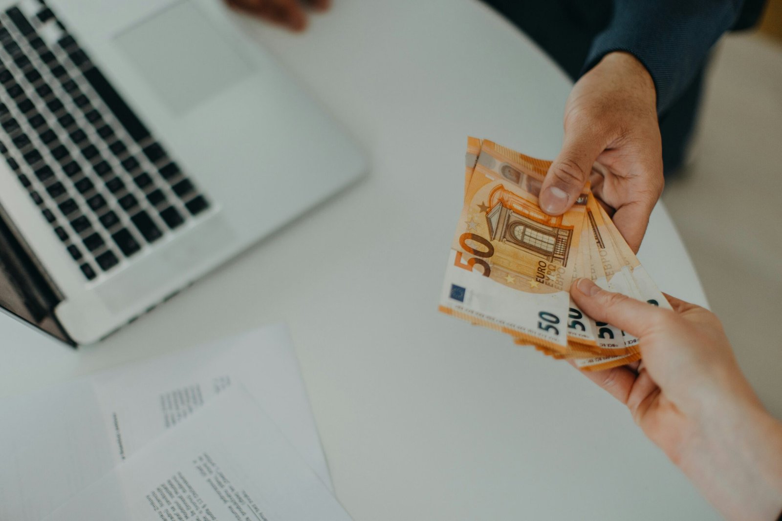 Man hoving over euros showing paid annuity income
