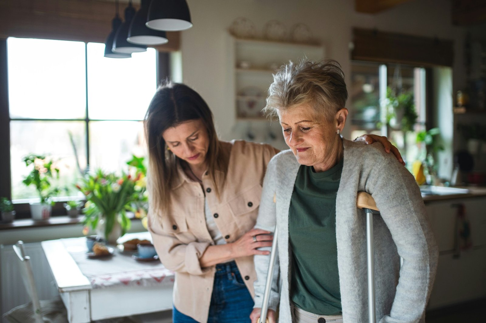 Woman being helped by her grand-daughter in retirement